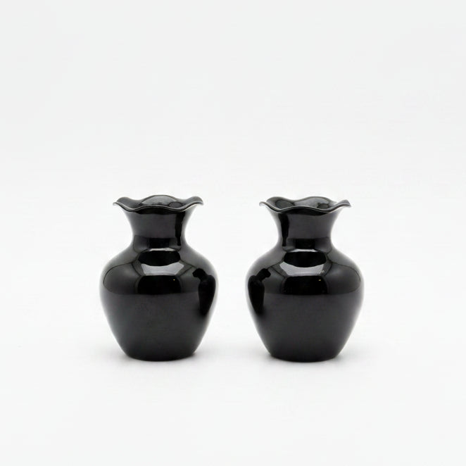 Two vintage glossy plum/black ceramic bud vases with flared rims
