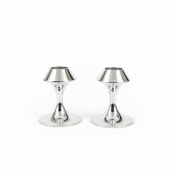 Two polished silver Lenox metal candlesticks.
