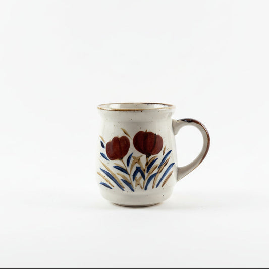 Vintage Japanese Stoneware Ceramic mug with floral design on a white background